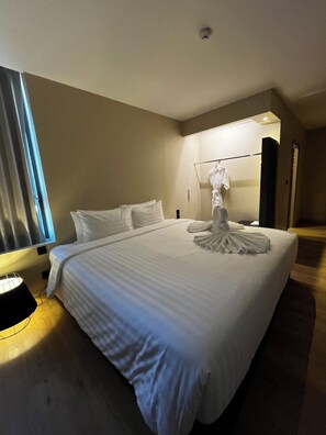 Family Apartment, City View | In-room safe, desk, laptop workspace, blackout drapes