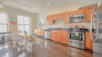 Fridge, coffee/tea maker, cookware/dishes/utensils