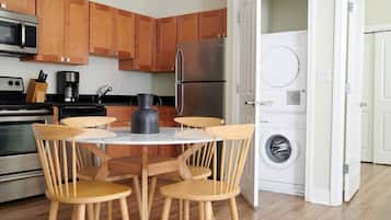 Fridge, coffee/tea maker, cookware/dishes/utensils