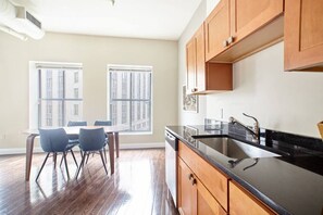 Fridge, coffee/tea maker, cookware/dishes/utensils - Open Air 2BR | FIDI Boston | Close to Everything! (Boston)