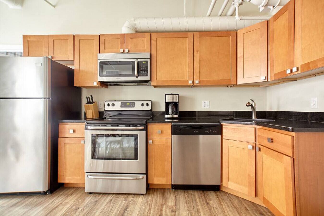 Fridge, coffee/tea maker, cookware/dishes/utensils