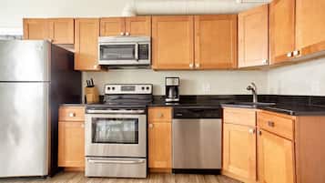 Fridge, coffee/tea maker, cookware/dishes/utensils
