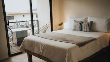 Deluxe Room, Balcony, Pool View | Iron/ironing board, free WiFi