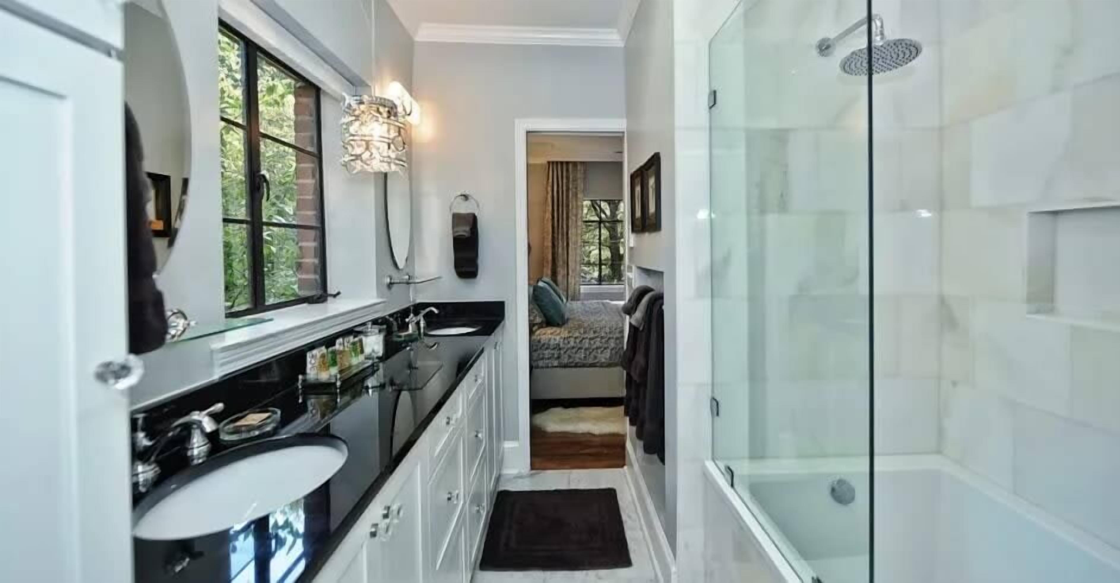 Shower, hair dryer, towels, shampoo