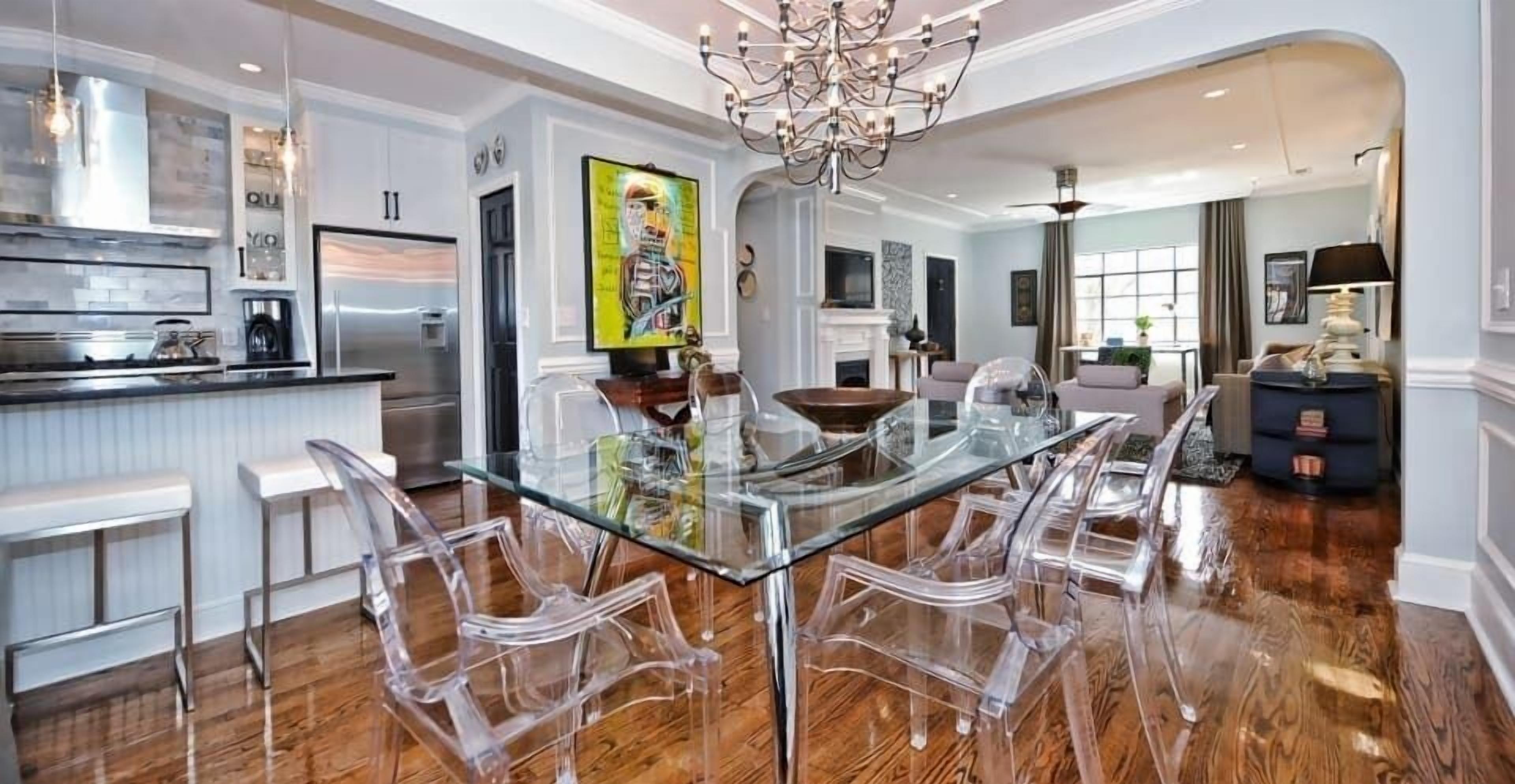 The elegant furniture and soft lighting create a sophisticated backdrop for any meal.