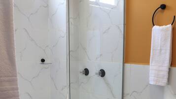 Shower, towels, soap, shampoo