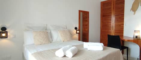 1 غرفة نوم ومكواة/لوح كي وخدمة الإنترنت وملاءات أسرّة