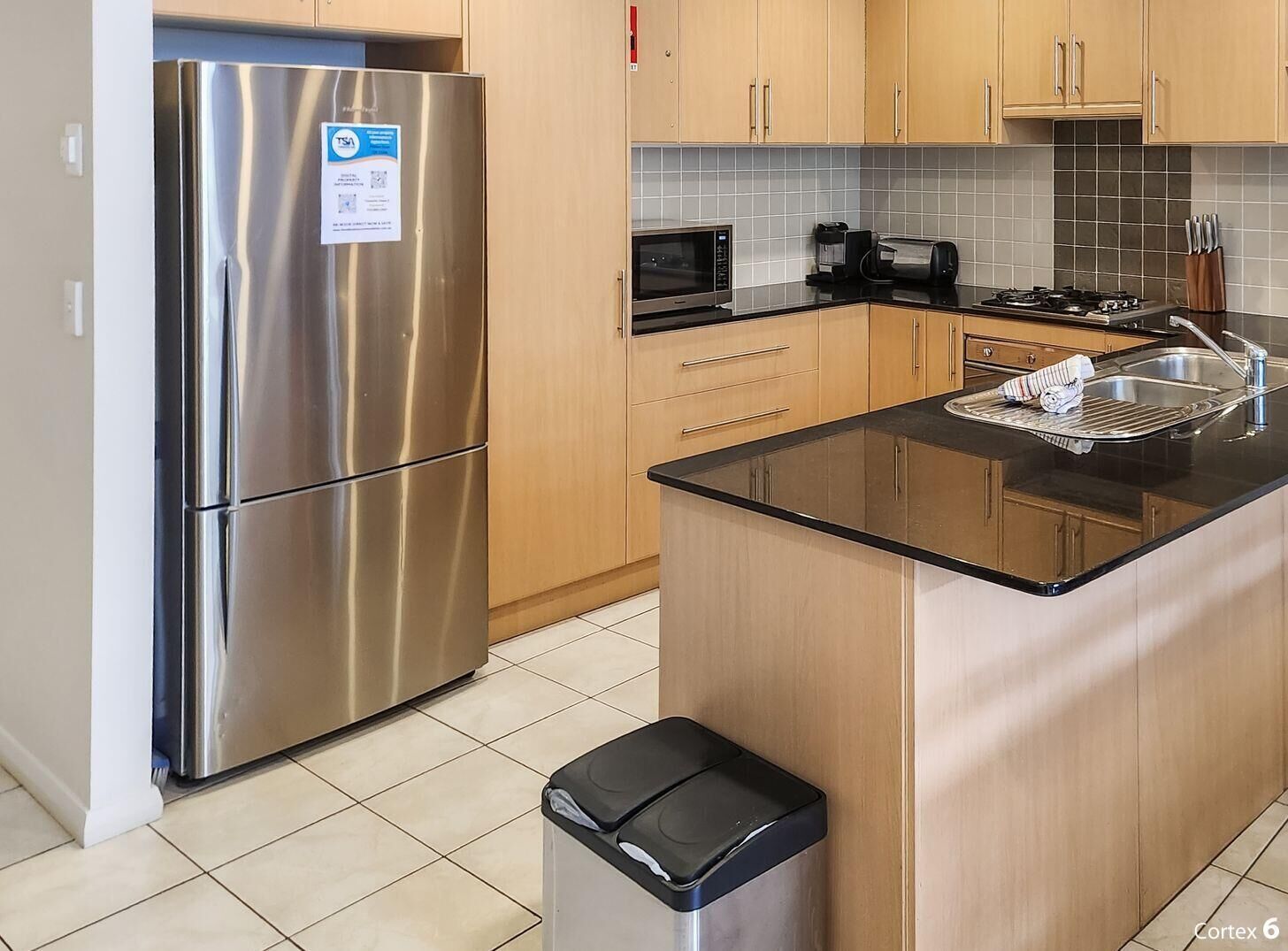 Coffee/tea maker, cookware/dishes/utensils, dining tables