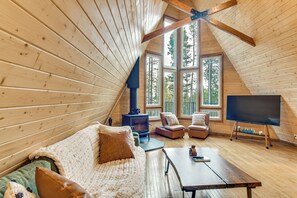 TV, fireplace, books - Wooded Retreat w/ Private Hot Tub in Evergreen (Evergreen)