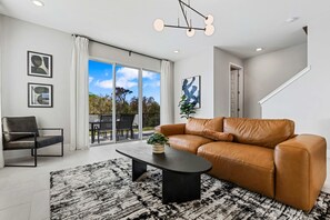 Comfort Townhome, 3 Bedrooms | Living area - Modern 3Bd End Unit with Garage & Water View 7904 (Kissimmee)