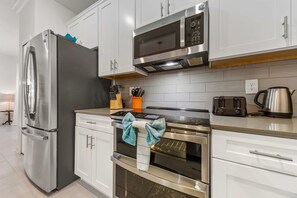 Premium Townhome, 5 Bedrooms | Private kitchen | Microwave, oven, stovetop, dishwasher - South-Facing Pool 5BR Storey Lake Lazy River 2437 (Kissimmee)
