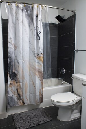 Hair dryer, towels, soap, toilet paper