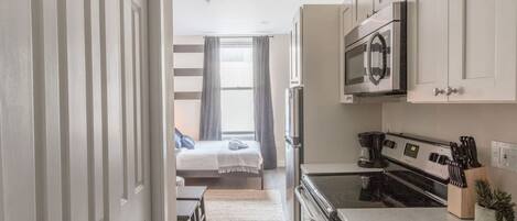 Refrigerador, microondas, horno, placa de cocina