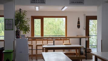 Full-sized fridge, microwave, cleaning supplies