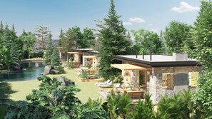 Un resort con numerose camere, una piscina e una vegetazione rigogliosa.