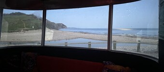 Off-grid trailer stay with valley views and dark skies