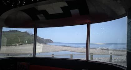 Off-grid trailer stay with valley views and dark skies