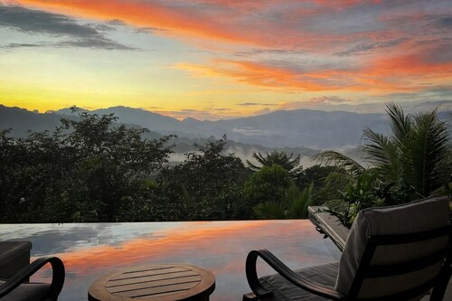 Magnificent mountain vistas and a vibrant bird paradise. Enjoy luxury comfort with a full kitchen, private laundry, and deep-well water. Relax in the shared salt-water pool and hot tub, recirculated daily for the freshest soak.