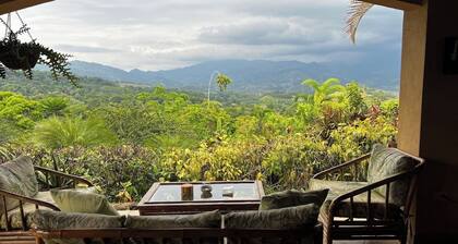 Magnificent mountain vistas and a vibrant bird paradise. Enjoy luxury comfort with a full kitchen, private laundry, and deep-well water. Relax in the shared salt-water pool and hot tub, recirculated daily for the freshest soak.