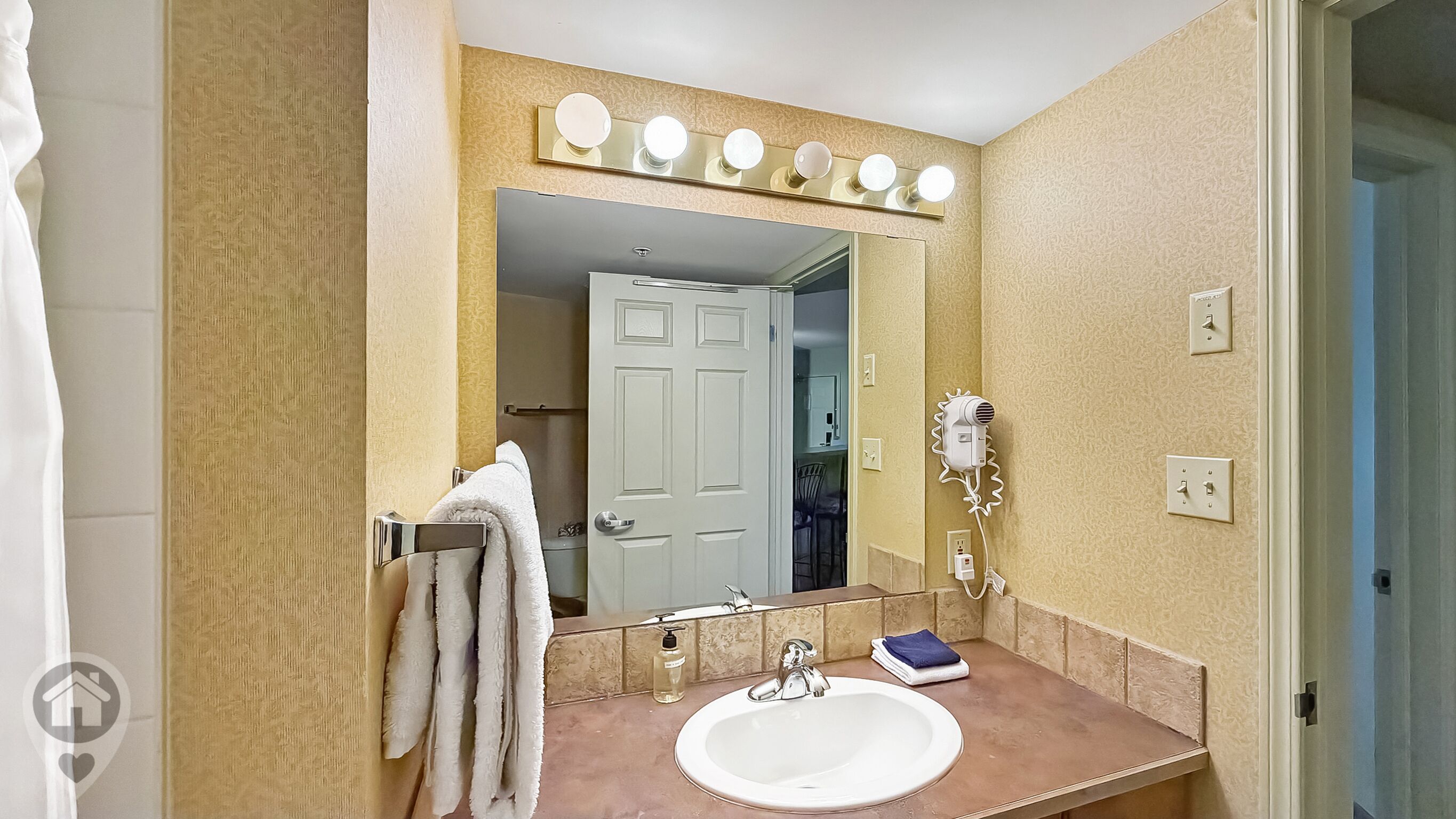 Hair dryer, towels, soap, shampoo