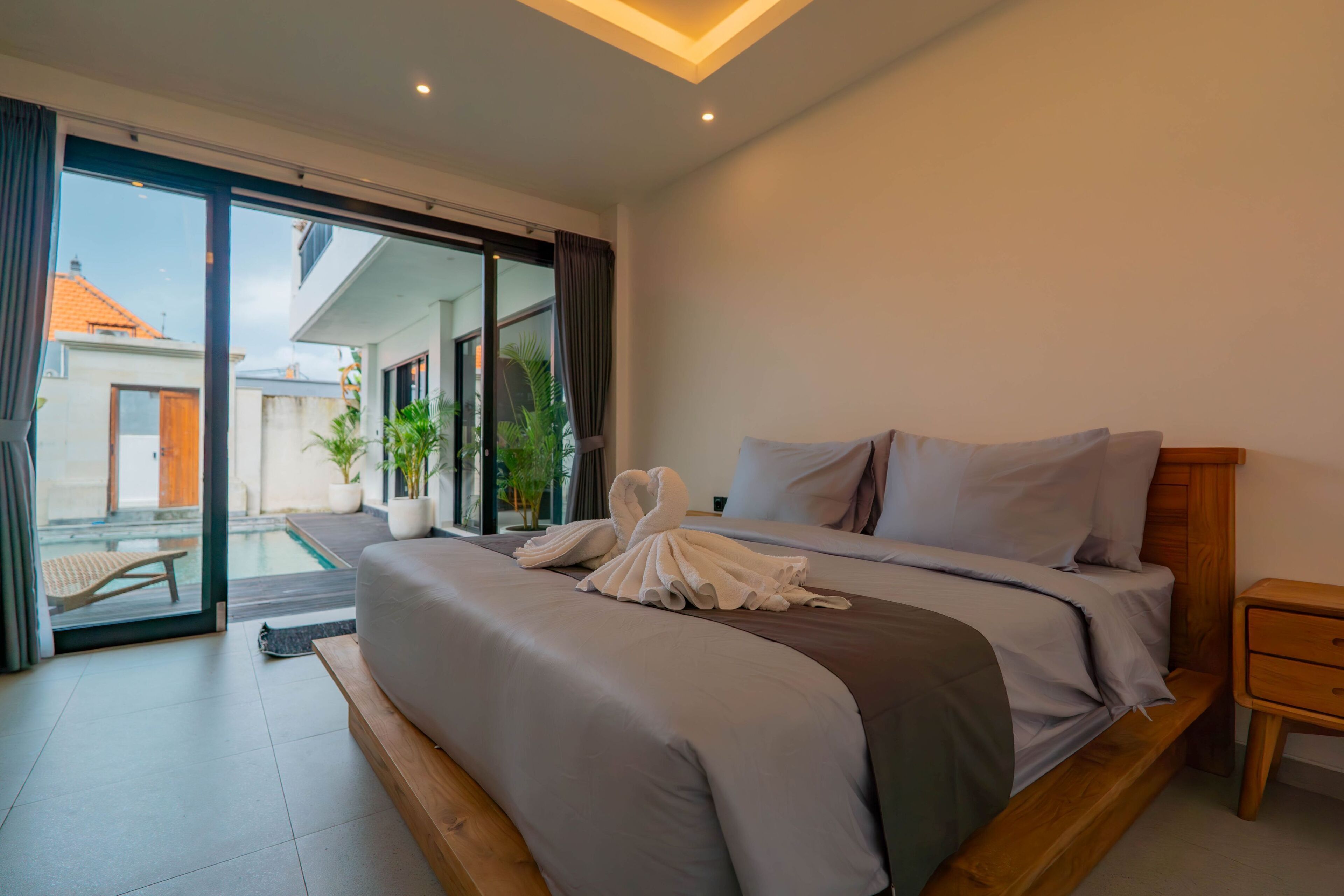 Family Triple Room, Balcony, Pool View | Desk, laptop workspace, free WiFi