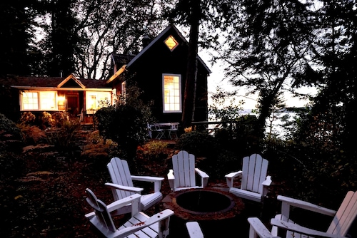 Storybook family cottage perched atop Penn Cove