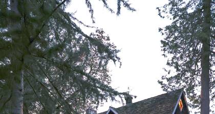 Storybook family cottage perched atop Penn Cove