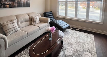 Stylish Three-Level Townhome Near Toronto with Parking and Workspaces
