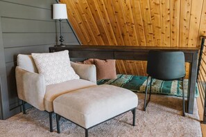 A cozy bedroom with a bed, a chair, and a sofa. - Lake Ida+Fish+Foosball+Bball+PingPong+Fire+Porch (Alexandria)