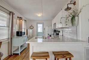 Private kitchen - Cozy 2BR retreat in North Topsail Beach, perfect for relaxing getaways (North Topsail Beach)