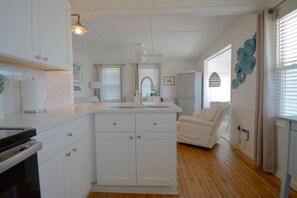 Private kitchen - Cozy 2BR retreat in North Topsail Beach, perfect for relaxing getaways (North Topsail Beach)