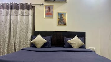 2 dormitorios, tabla de planchar con plancha, Internet y ropa de cama