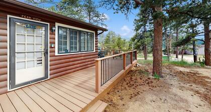 Ideal vacation home with wraparound deck & Rocky Mountain view