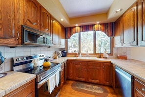 Fridge, microwave, oven, stovetop - Spacious, dog-friendly home w/private hot tub on large deck, mtn views, & more (Estes Park)