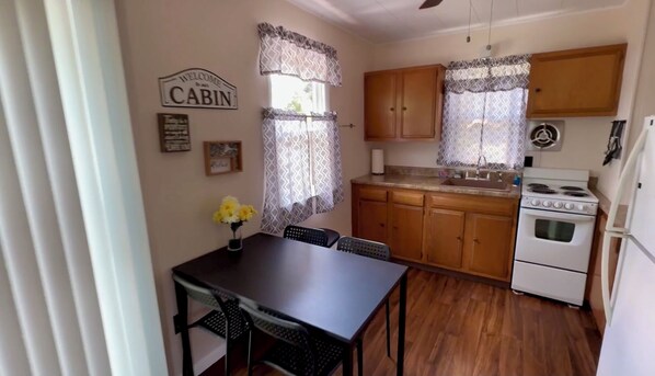Private kitchen -  2-bedroom cabin with AC on a secluded cove of Lake Ogemaw. (West Branch)