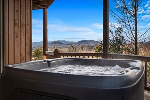 A hot tub on a wooden deck with a view of mountains. - Peaks & Quiet Retreat - Views From Every Room and Dog Friendly (Morganton)