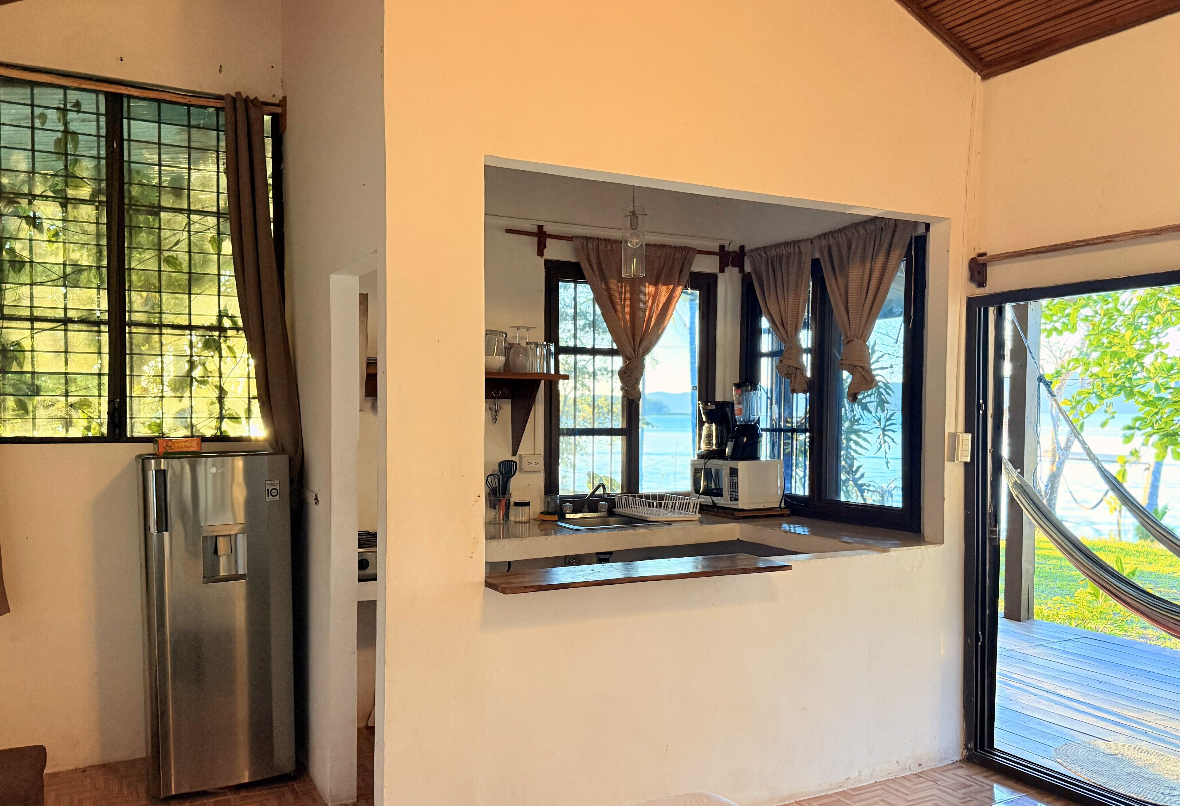 Microwave, coffee/tea maker, cookware/dishes/utensils, spices