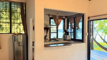 Microwave, coffee/tea maker, cookware/dishes/utensils, spices