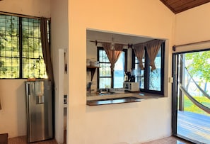 Microwave, coffee/tea maker, cookware/dishes/utensils, spices