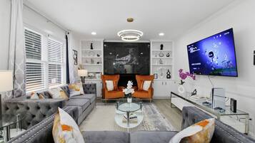 TV connectée, cheminée, jeux vidéo