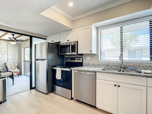 Fridge, microwave, oven, stovetop - Chillax Island Condo – Beach, Bay & Pool (Englewood)