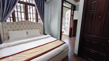 Deluxe Double Room, City View | Blackout drapes, soundproofing, iron/ironing board, free WiFi