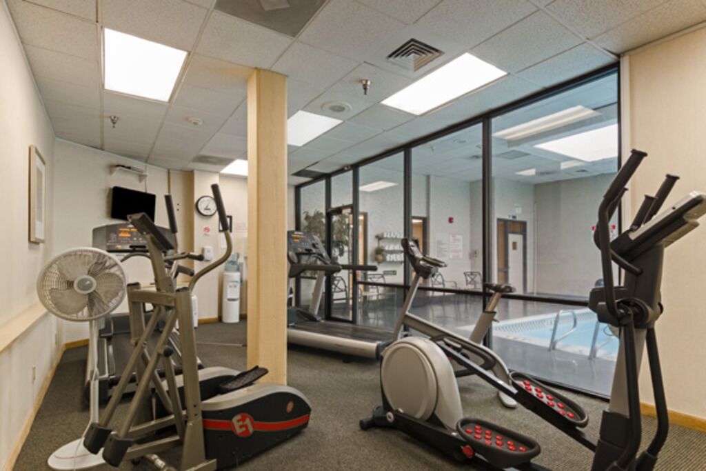 Work out with views of the pool area next door.