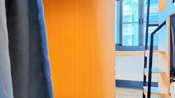 Basic Shared Dormitory, Women only | Blackout drapes, free WiFi, bed sheets