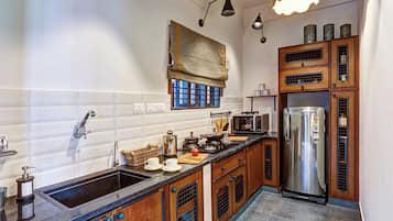 Industrial Style 1BHK APT w/Balc 303 | Private kitchen | Full-size fridge, microwave, stovetop, cookware/dishes/utensils