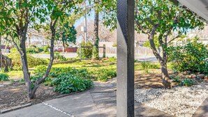 A garden with trees and a paved walkway. - 1 Mi to Main St Eats! Single-Level Red Bluff Home (Red Bluff)