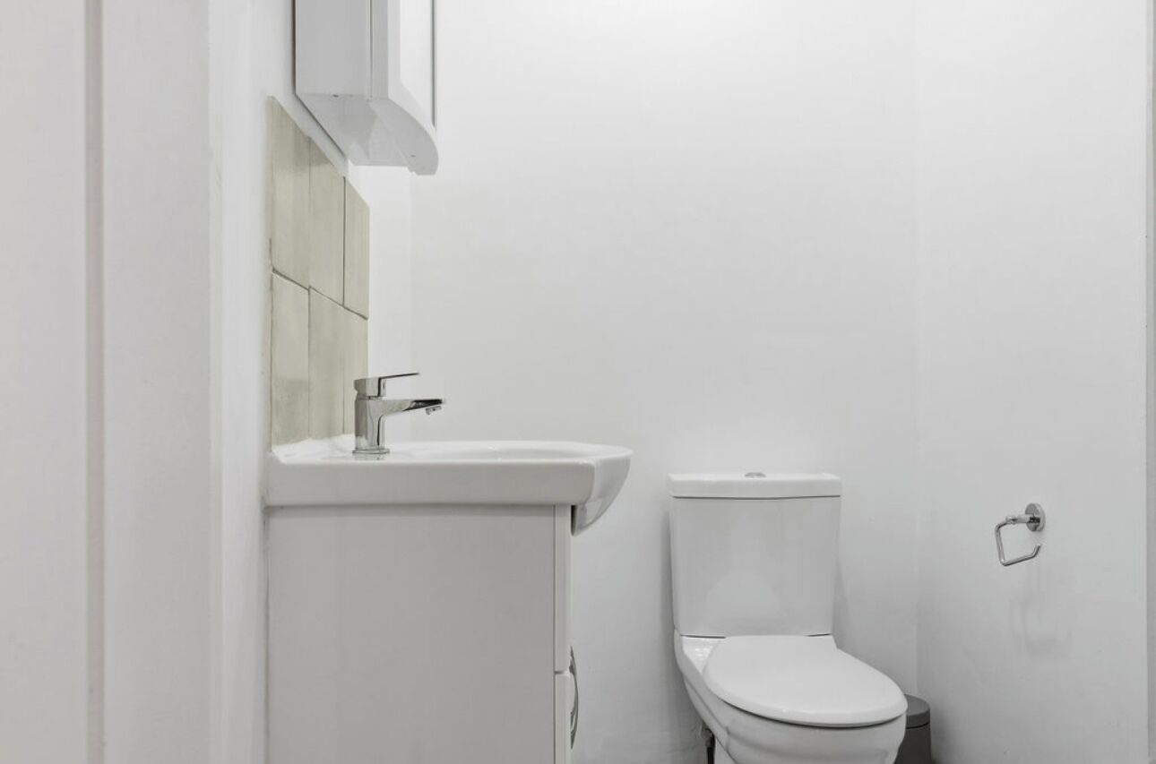 Shower, hair dryer, towels, toilet paper