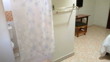 Desk, laptop workspace, blackout curtains, iron/ironing board