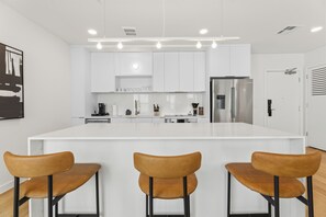 Fridge, oven, stovetop, dishwasher - King Suite w/ Private Balcony | Steps to Zilker Park & Lady Bird | The Code (Austin)