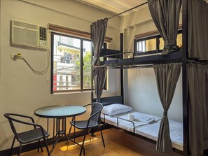 1 bedroom, WiFi, bed sheets - Private Room for 4 at The Budget Inn Makati with WiFi & Ensuite Bath (Makati City)